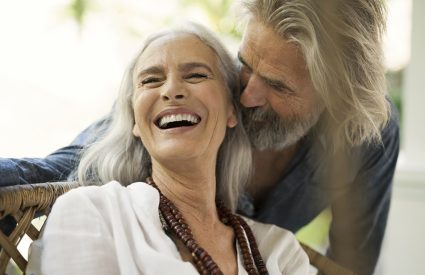 An older women and man engage in a flirtatious exchange and discuss sexuality over 50 years old