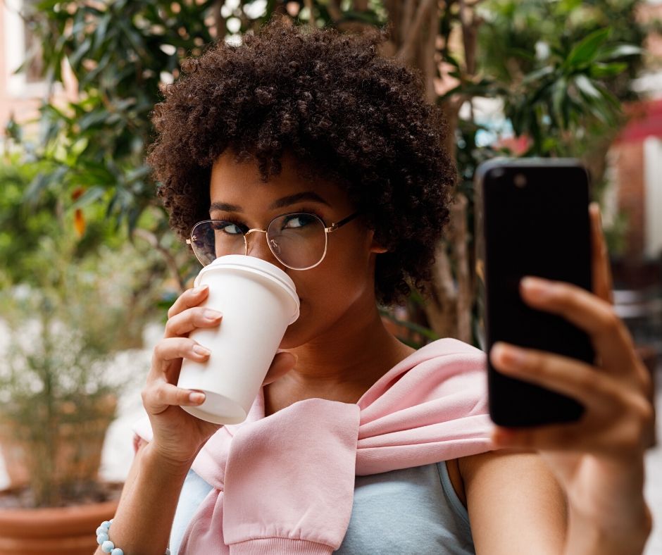 woman taking selfie for online dating app