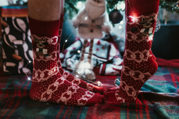 Couple wearing holiday socks
