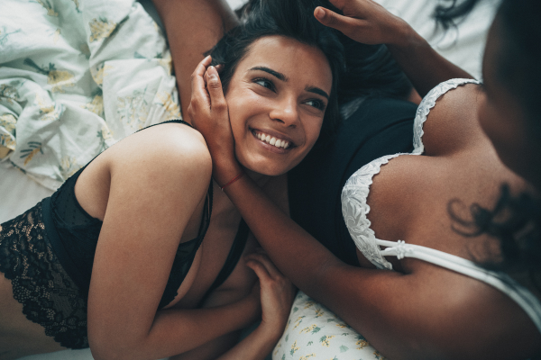 two women in bed